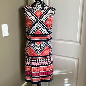 Fabulous Aztec print navy dress with rounded neckline and overlay over bustline